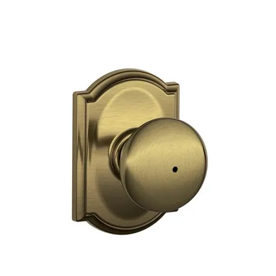 Schlage Residential F40PLY609CAM Plymouth Knob with Camelot Rose Privacy Lock with 16080 Latch and 10027 Strike Antique Brass Finish